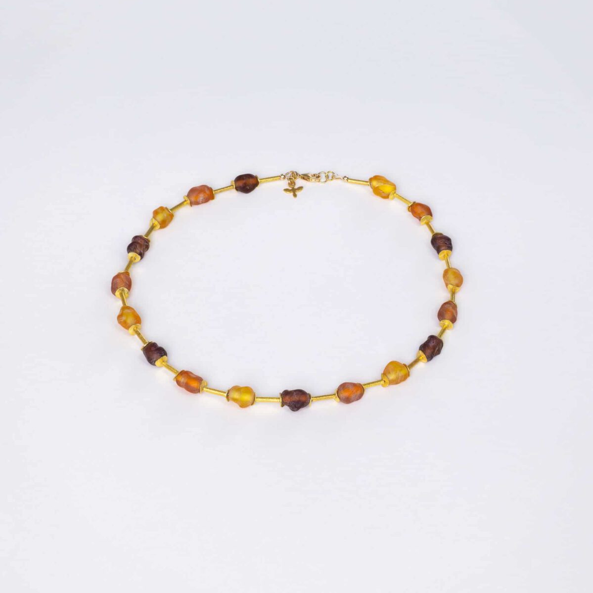 SAROCCA Glas Schmuck individuell nachhaltig Halskette orange braun gelb vergoldetes Silber