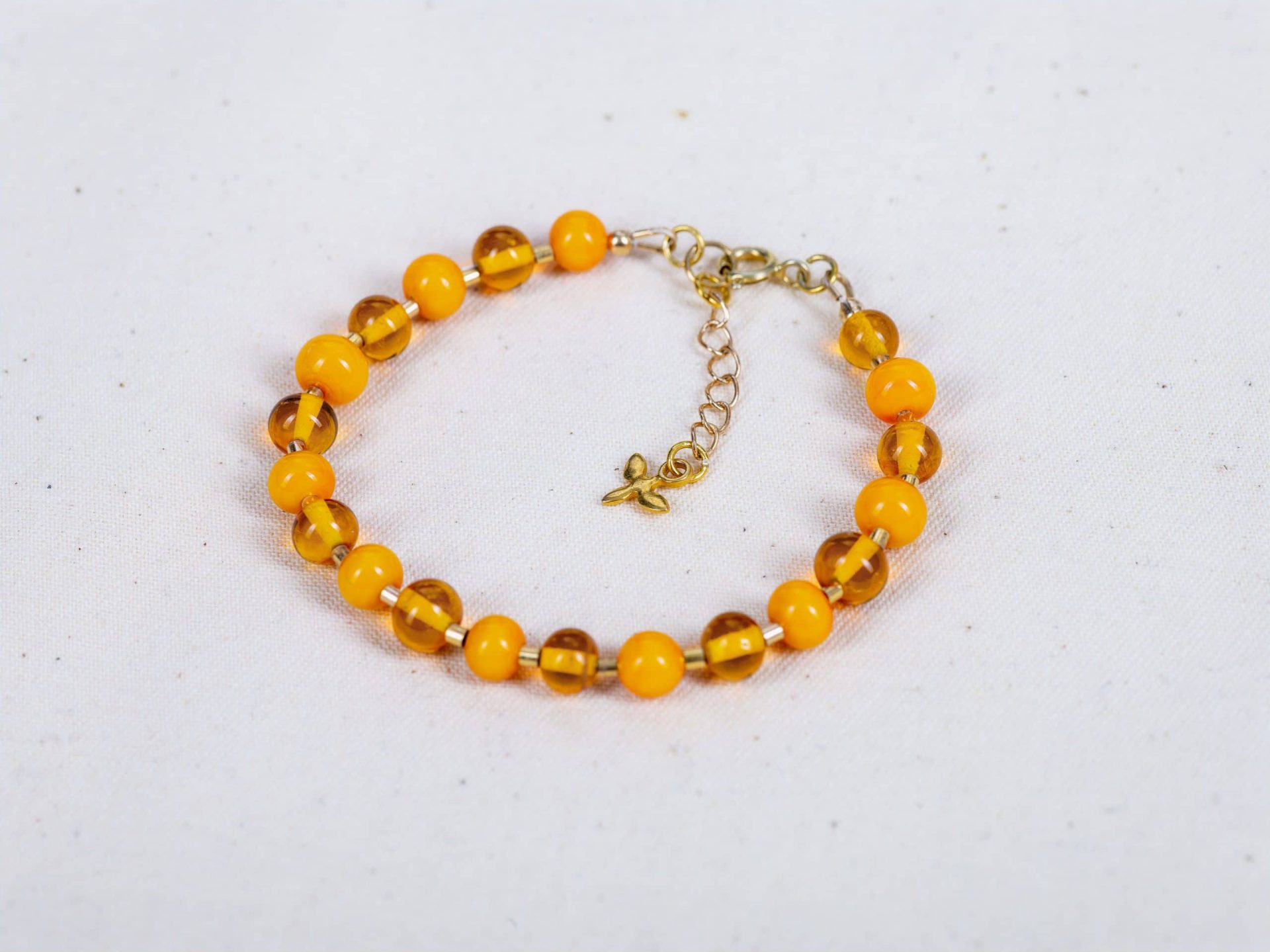 SAROCCA Glas Schmuck individuell nachhaltig Armband orange vergoldetes Silber